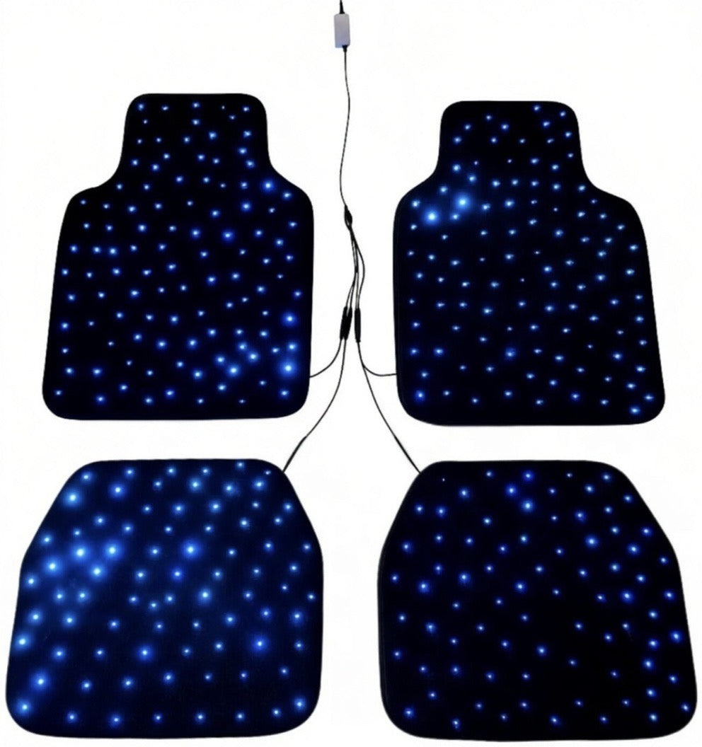 RGB starlight LED floor mats glowing in car interior footwell